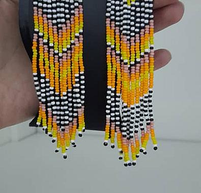 حلق برتقالي طويل